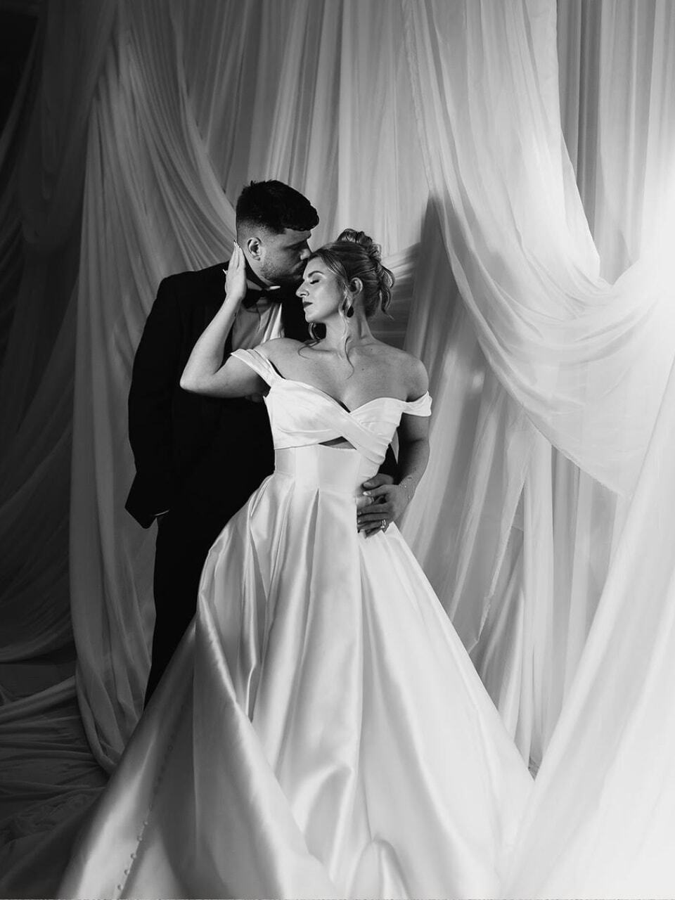 Black and white photo of bride and groom